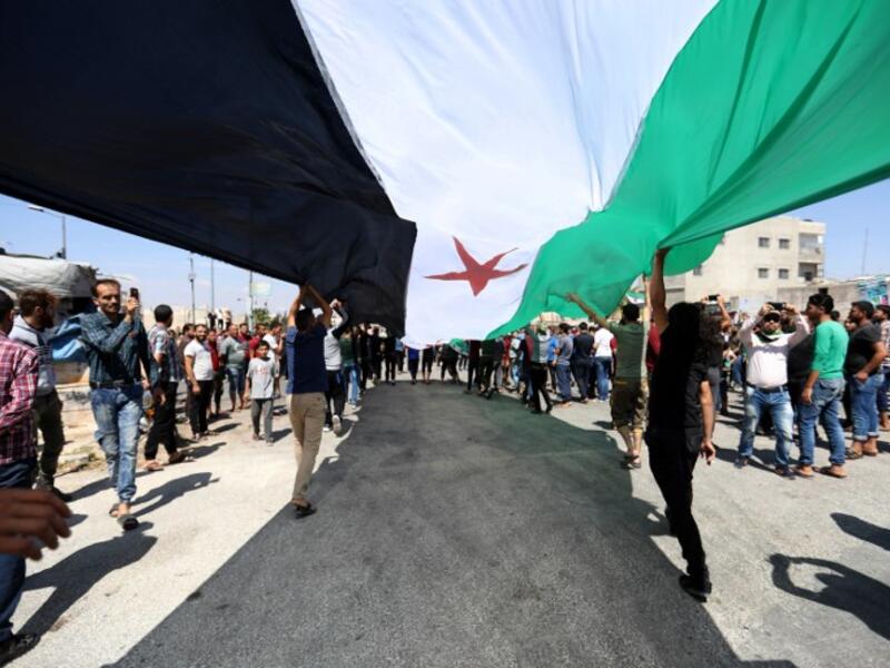 Damascus has every right to take back all its territory, Russian President Vladimir Putin told a summit on September 7 expected to decide the fate of Syria's last major rebel bastion Idlib. (OMAR HAJ KADOUR / AFP)