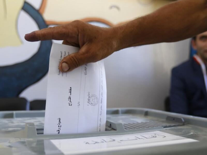 A man casts his ballot for Syria's first local elections since 2011, on September 16, 2018 in the southern Eastern Ghouta, on the eastern outskirts of the capital Damascus. (LOUAI BESHARA / AFP)