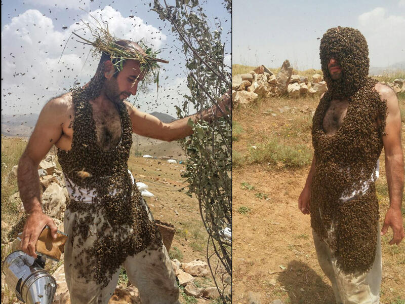 Abdulvahap Semo, a beekeeper from eastern Turkey, is attempting to break the world record for the number of bees covering a person. (Twitter/Daily Sabah)