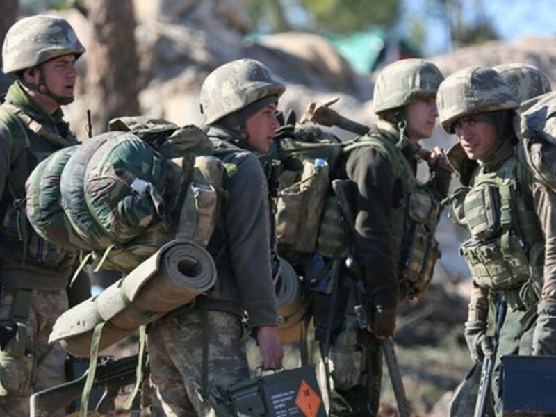 Turkish soldiers are deployed on Mount Bersaya, north of the Syrian town of Azaz near the border with Turkey. (AFP Photo)