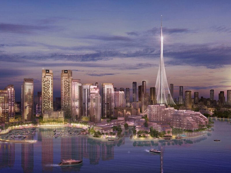 The Tower, however, is not a "traditional skyscraper" but a slender tower evoking the image of a minaret anchored to the ground with sturdy cables. (Emaar)