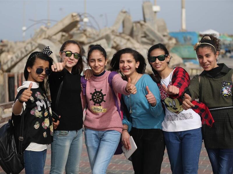 Gaza City: Palestinian students on a trip to Gaza City to mark International Women's Day. (AFP/Mohammed Abed)
