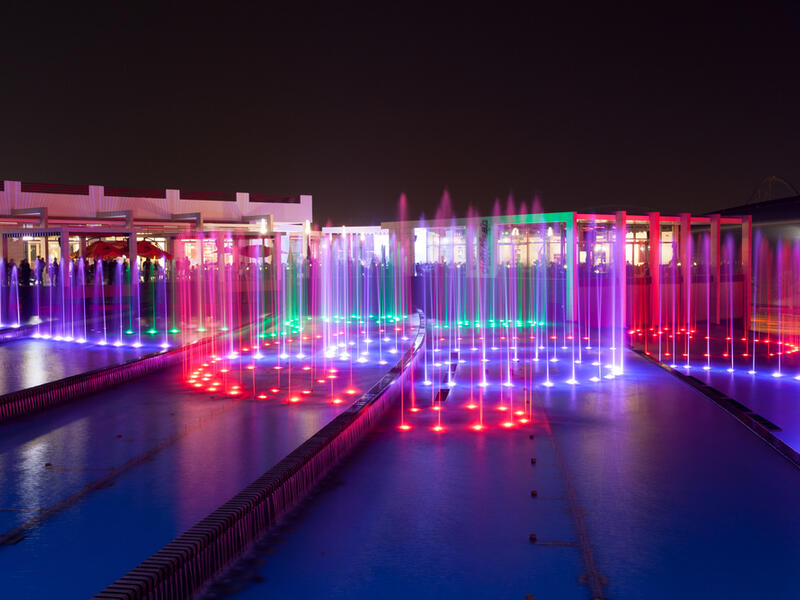 Fountain at the Ferrari World Theme Park illuminated at night. (Shutterstock/ File Photo)