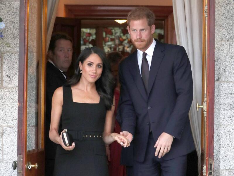 Harry and Meghan attend a summer party at the British Ambassador's residence at Glencairn House
(AFP/File)