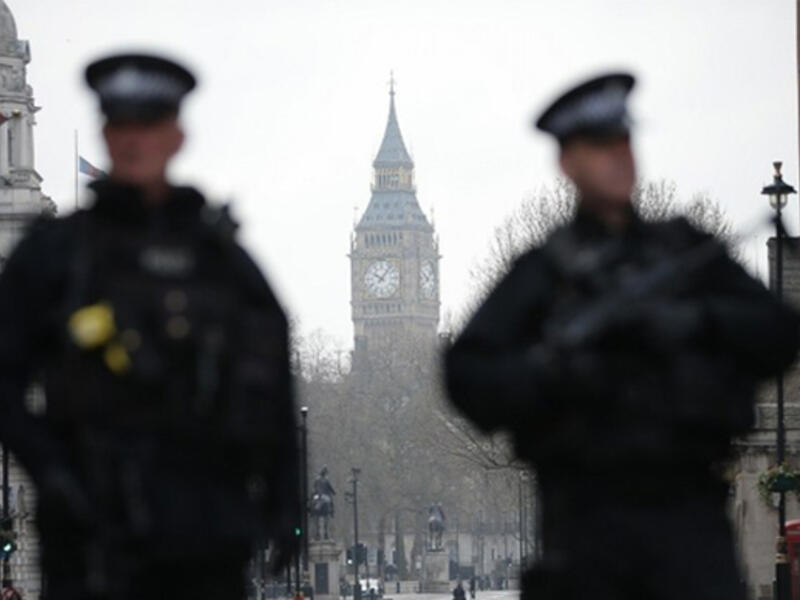 Armed police secure the area around the Houses of Parliament (AFP)