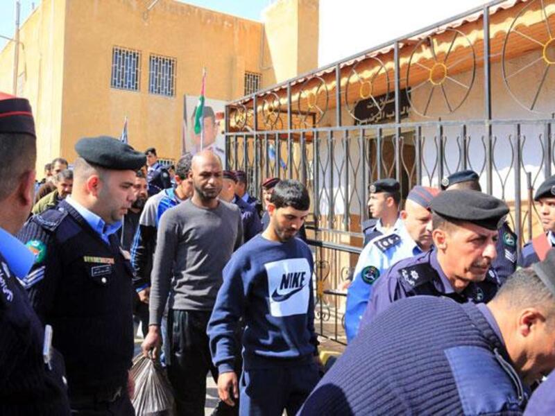 Scores of inmates were released on Tuesday as the 2018 General Pardon Law went into effect. Officials said the releases would continue until the law is fully implemented. (Petra photos)