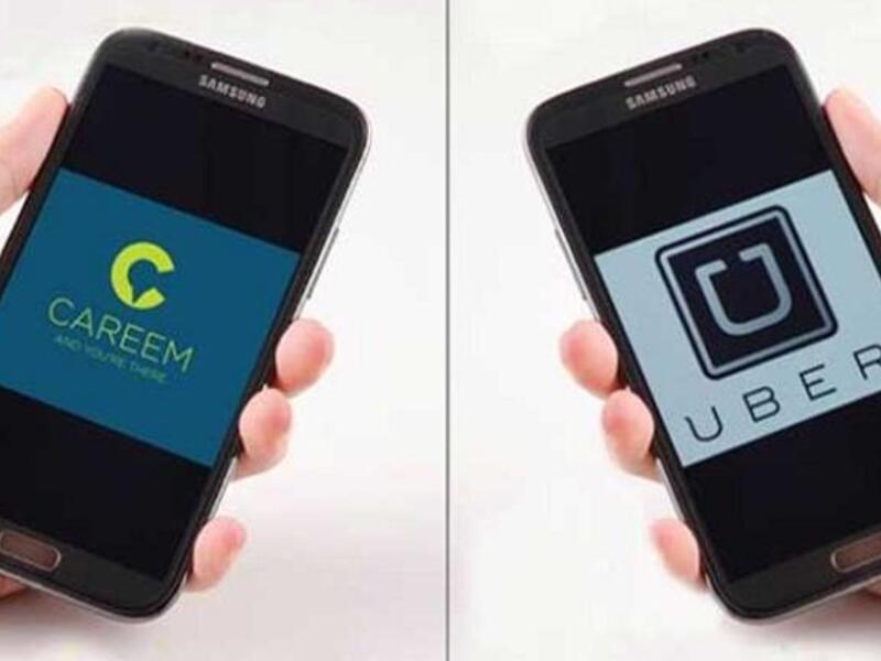 Egyptian Transport Committee postpones meeting scheduled to discuss legalization regarding ride-hailing services Uber and Careem due to elections. (AFP/ File Photo)