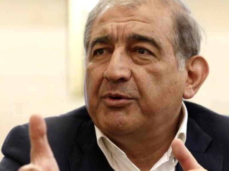 Syria's deputy PM Qadri Jamil was fired from office Tuesday for meeting with US representatives this past weekend to discuss the proposed Geneva peace talks to end the conflict in Syria (AP)