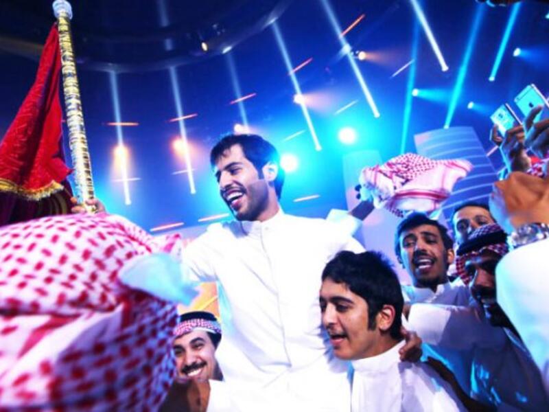 Kuwaiti student Rajih al-Hamidani celebrates after winning the TV poetry competition 'Million's Poet' in Abu Dhabi on May 17, 2016.  (AFP/File)