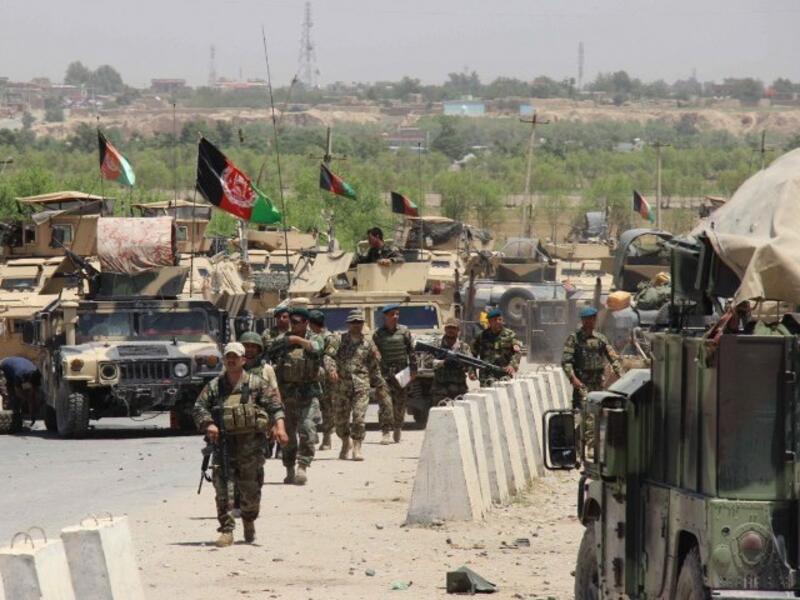 Afghan troops walk in the Chardarah district of Kunduz province on June 21, 2015. (AFP/File)
