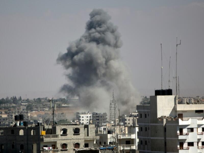 Smoke rises following an Israeli strike (AFP/File Photo)
