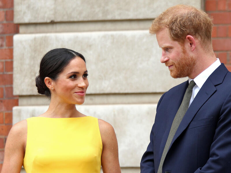 Britain's Prince Harry, Duke of Sussex and Britain's Meghan, Duchess of Sussex arrive to attend a reception marking the culmination of the Commonwealth Secretariats Youth Leadership Workshop. (AFP)