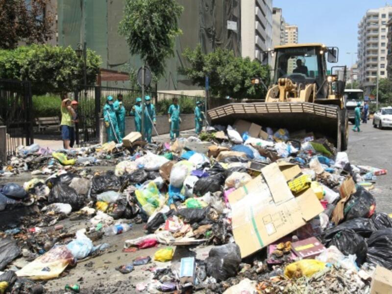 The municipality of Lebanon's coastal town of Jounieh used bulldozers to fill more than ten truckloads of trash per day and paid to have them transported to privately owned land in Tripoli province. (AFP/File)