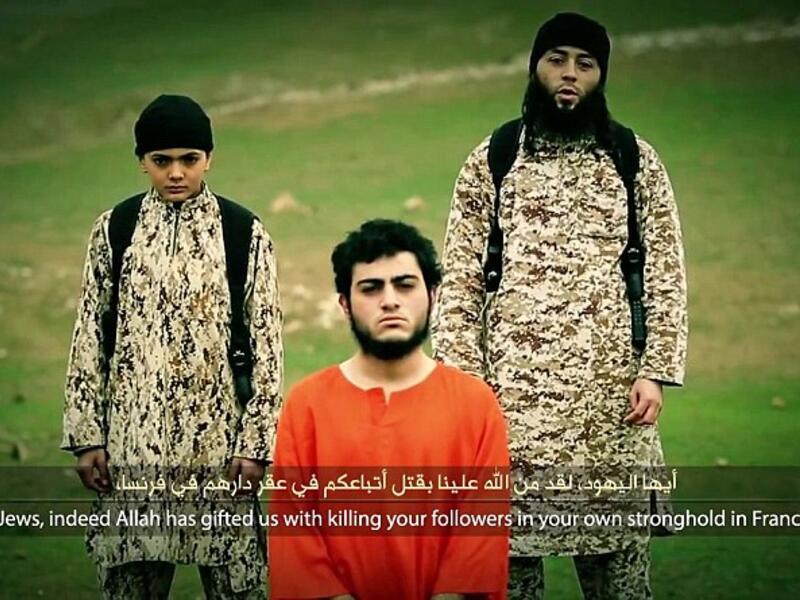 In the Daesh video the child shoots an Arab-Israeli accused of spying for Israel (File-AFP)