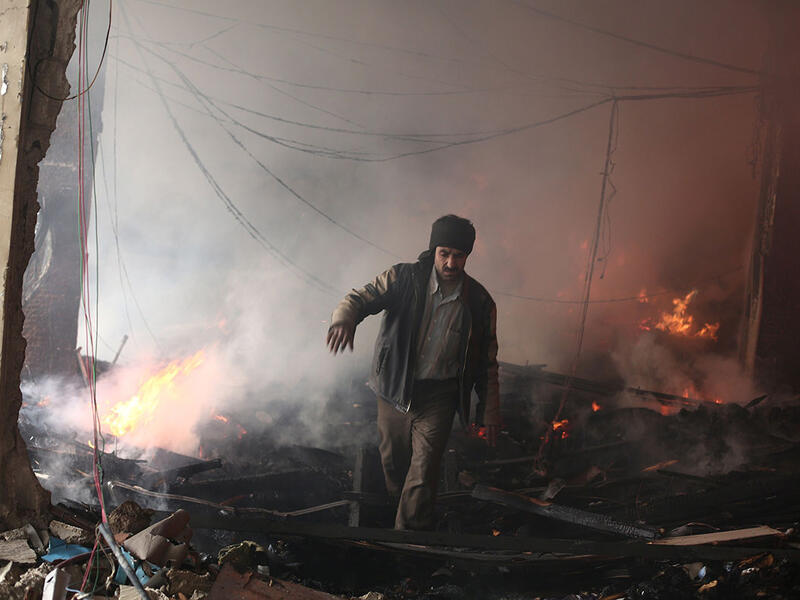 The city outside Damascus has been hit hard with government shelling all month, the latest of which killed at least 34 and injured 200 more. (AFP/File)