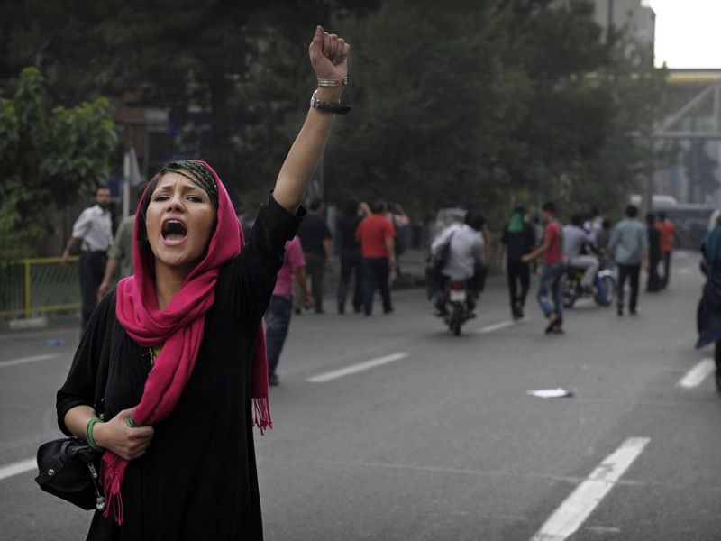 Women protest hijab (AFP/File Photo)