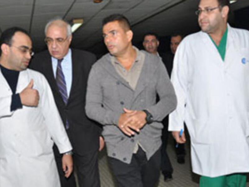 Amro Diab visiting patients at hospital