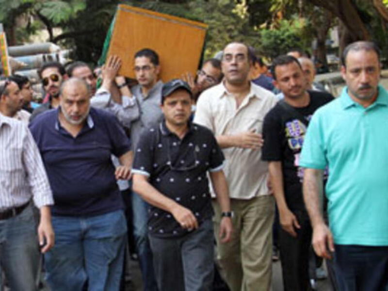 Mohammad Huneidi during burial ceremony