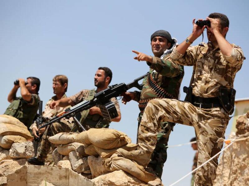 Kurdish peshmerga forces take position near Mosul in Iraq, August 15, 2014. (AFP/File)