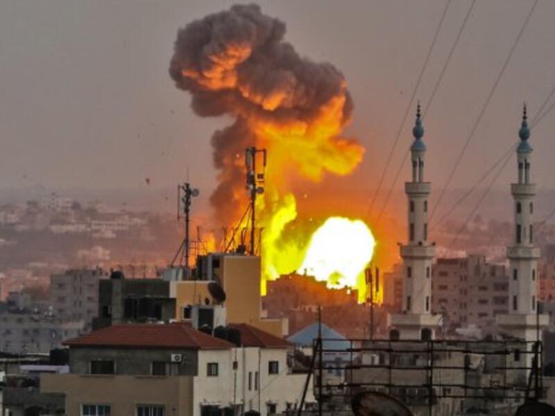 Fireball exploding in Gaza City during Israeli bombardment.