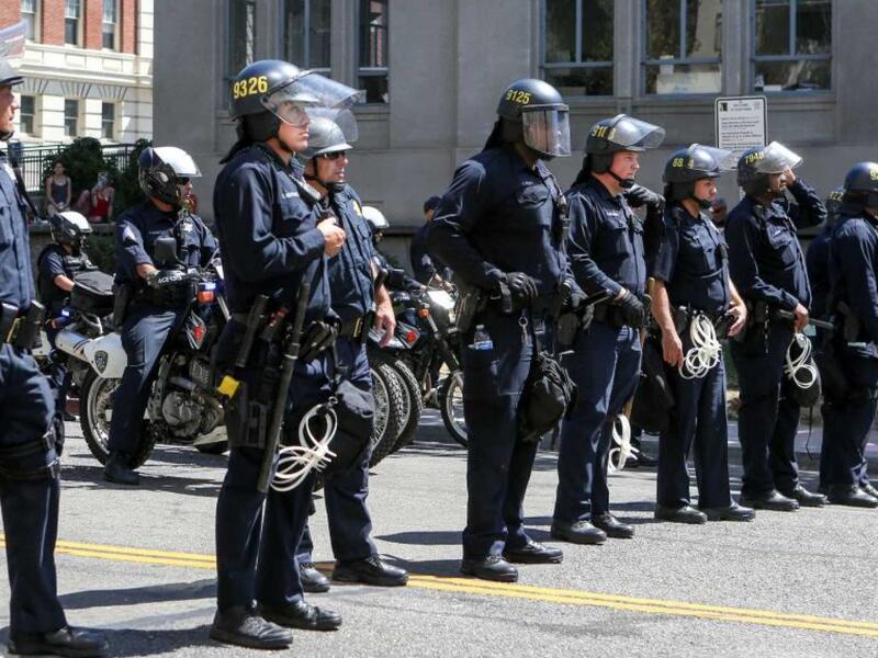 California police officers stand guard (AFP/File Photo)	