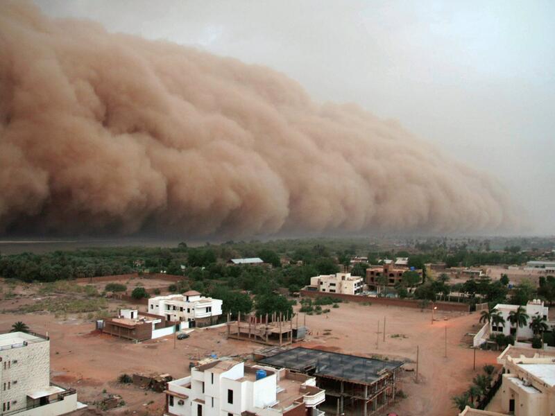 A haboob, similar to the one that swept over small-town Lubbock, Texas on Sunday, is seen over Khartoum. Intense dust storms caused by downward-flowing winds from thunderstorms, haboobs are common in the American southwest and parts of the Middle East.  (AFP/File).  