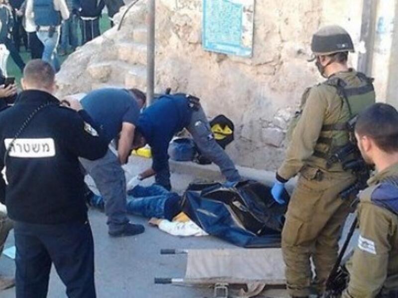IDF officers at the scene of a separate stabbing incident in which the assailant was killed. (AFP/File)