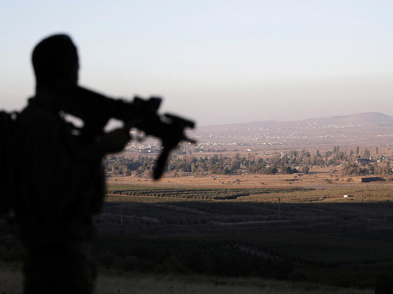 An Israeli soldier is stationed near the Israeli-Syrian border, August 2015.  (AFP/File)