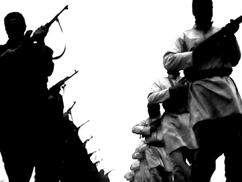 ISIS fighters (Rami Khoury/Al Bawaba via AFP/FILE)