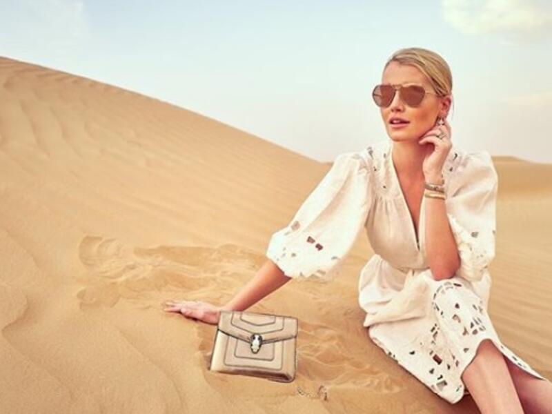 While in Dubai, Lady Kitty Spencer took to the desert where she posed for photos in a cinched-at-the-waist white dress by Australian fashion house Zimmermann. (Source: kitty.spencer - Instagram)