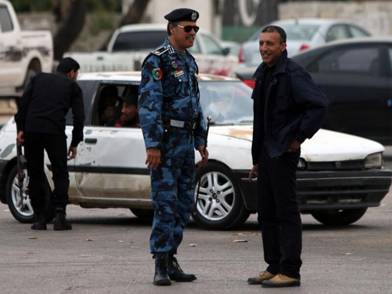 Libyan security forces monitor a protest in Benghazi. (AFP/Abdullah Doma)
