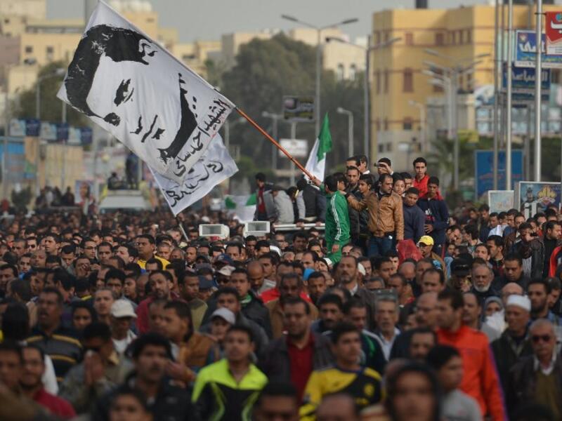 Egyptians attend the funeral procession of Abdelhalim Mehana, who was killed during clashes with riot police in Port Said on March 4. AFP PHOTO / KHALED DESOUKI