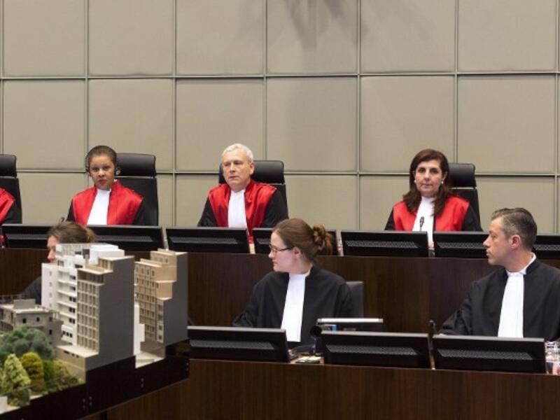 Four Hezbollah members went on trial in absentia at a UN-backed tribunal accused of murdering Hariri in a 2005 car bombing, with sectarian tensions running high at home. [AFP]