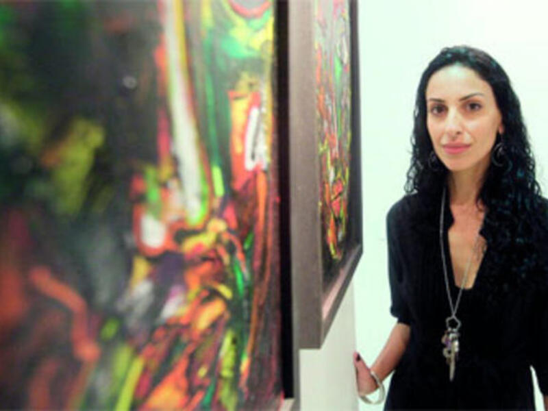 Lina Ogaili studied at Britain's University of Kingston, and she is a member of the Emirates Society for Fine Arts in the UAE.