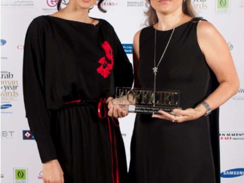 Larissa Kuzmina, Marketing Manager of Mauzan, receiving L’Officiel Middle East Arab Woman of the Year Award 2011