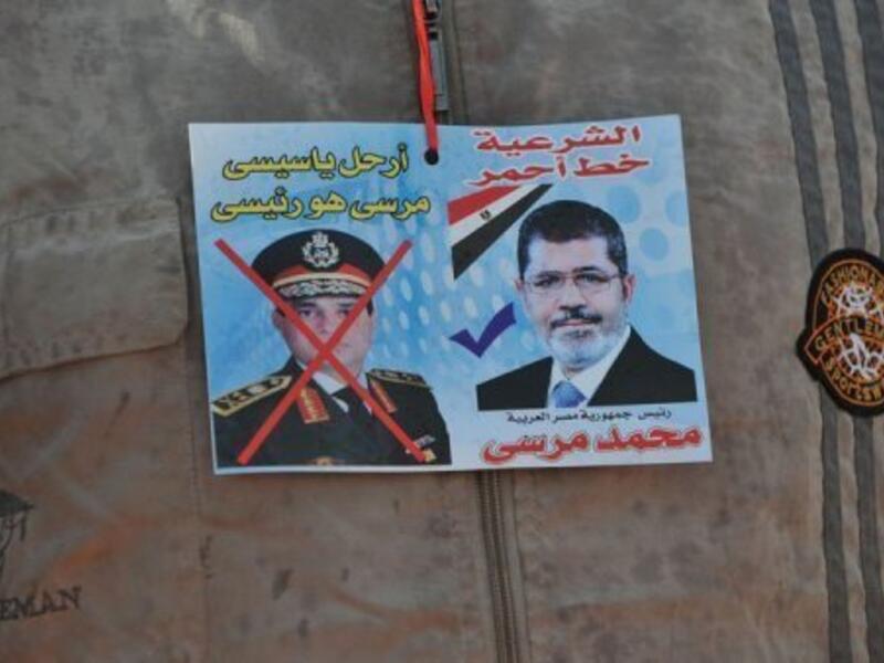 During an interview with Al Masry Al Youm, Egyptian Defence Minister Abdel Fattah El Sisi revealed that before Morsi's ousting, he attempted numerous times to reconcile the Muslim Brotherhood and opposition forces. (AFP/File)