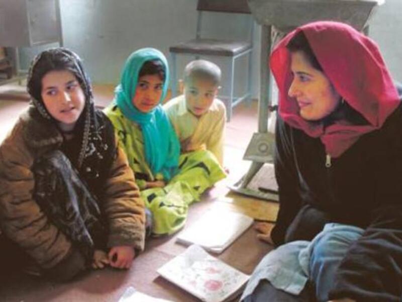 Saving Face from Sharmeen Obaid Chinoy (right) is a story of hope and a fight for justice. It will screen at the Abu Dhabi Film Festival.