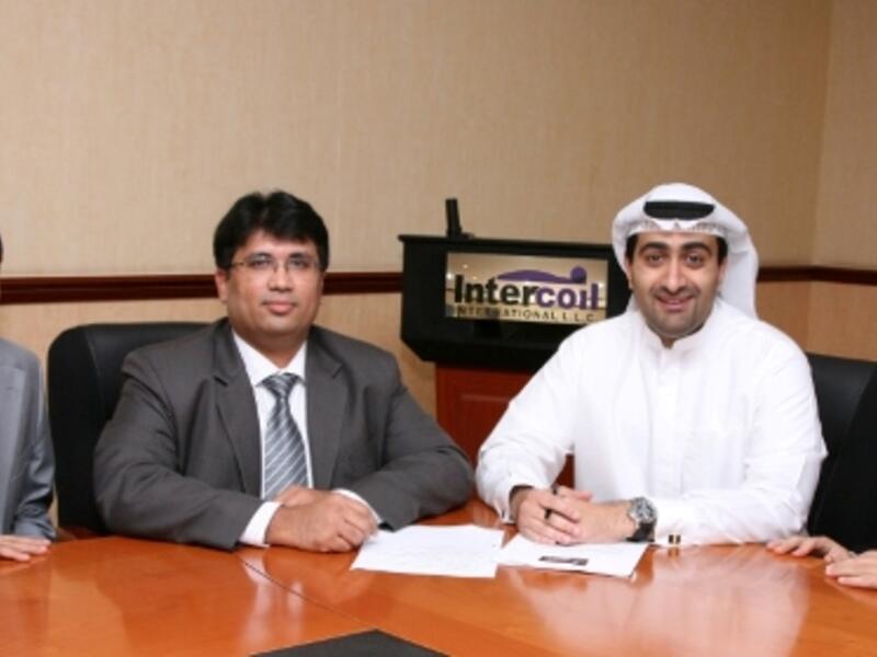 Executives during the agreement signing