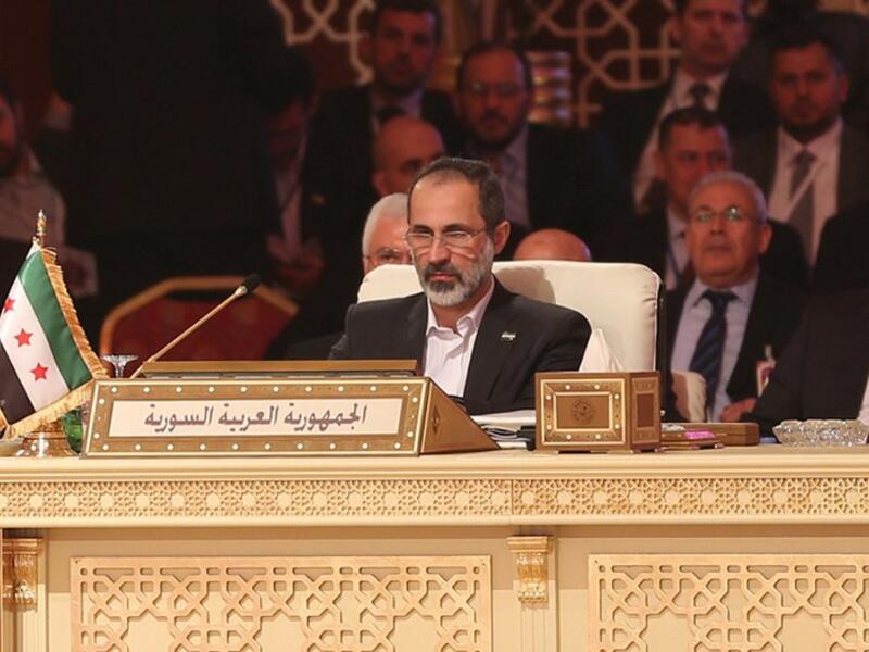 Moaz al-Khatib attends the Arab League summit in Doha (AFP Photo)