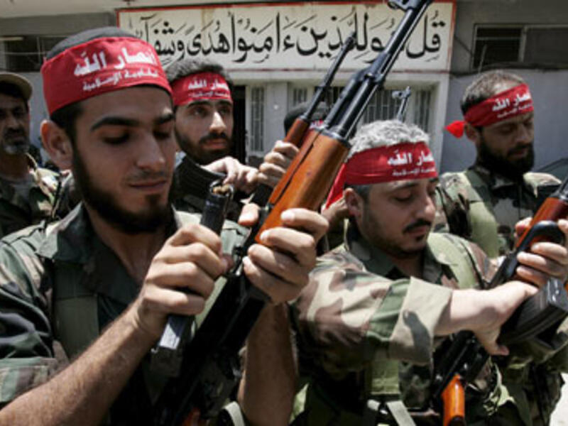 AIn Al Hilweh, the Palestinian refugee camp in Lebanon's south considered a "hotbed" for militants, fears a possible armed sectarian clash with Hezbollah forces due to the latter's politics at home and in Syria (Courtesy of the Guardian)