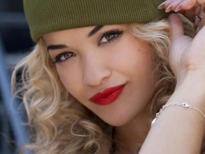 Rita is ready to trade in winter hat for summer wear