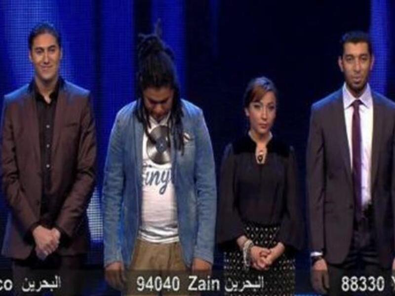 Sherine's team nervously await the results 