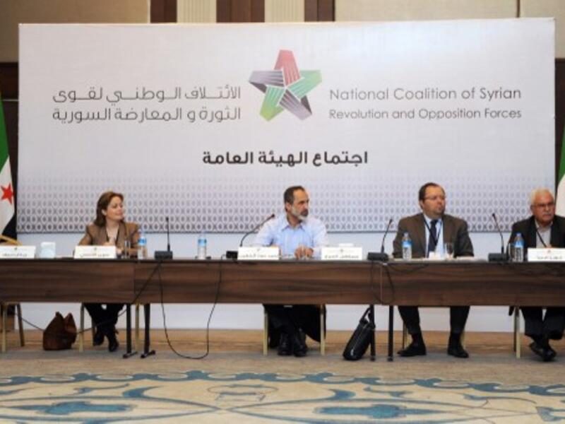  Suheir Attasi (L1) , Mostafa Sabbagh Syrian opposition's National Coalition chief Ahmed Moaz al-Khatib (CL) , Mostafa Sabbah(CR) and George Sebra (R) attend Syria's opposition coalition meeting on Monday in Istanbul to choose their first prime minister. (Photo: AFP / OZAN KOSE)