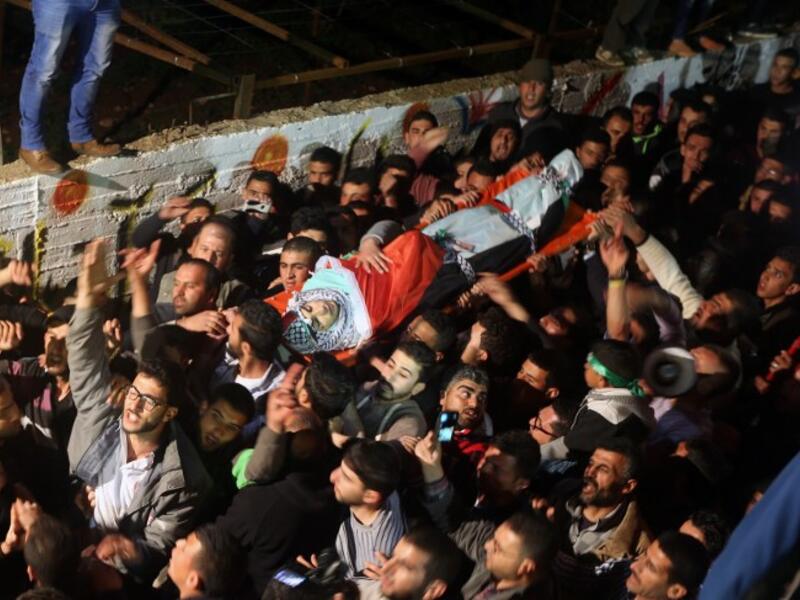 Israel regularly withholds bodies of slain Palestinians for months on end, for fear that funerals would turn into protests. (AFP/File)