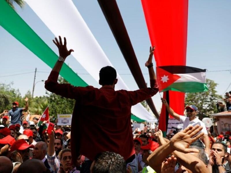 Jordan is currently going through difficult conditions, and internal and external challenges, including an increase in unemployment rates. (AFP)