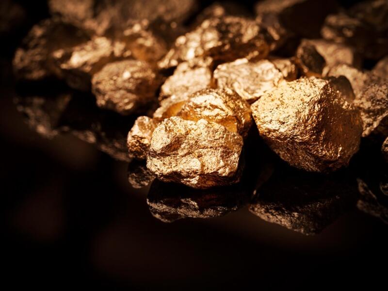 Commercials will typically trigger gold to fall through support levels and as Managed Money sells. (Shutterstock)