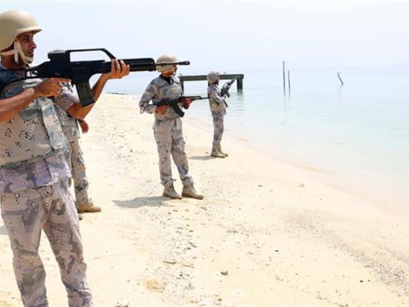 Members of Saudi border guard pose for pictures in the Ashiq island, in the southern Jizan Province near the border with Yemen on April 1, 2015. (AFP/File)