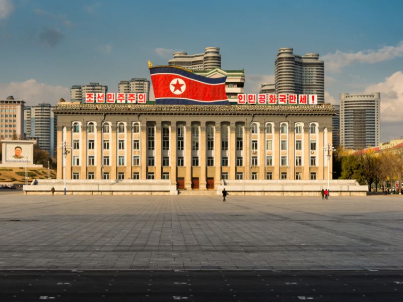 Kim Il-sung Square and government building decorated with national flag of Democratic People's Republic of Korea in central Pyongyang.(Shutterstock/ File Photo)