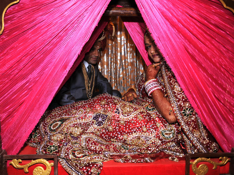 Indian people doing Wedding Rituals (Shutterstock)	
