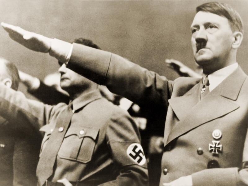 Adolf Hitler, giving Nazi salute (Shutterstock)